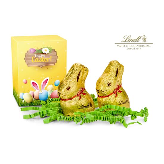 2 Lindt Goldhasen (Vollmilch & weiße Schokolade) verpackt in einer österlichen Faltschachtel. Auch individuell gestaltbar.