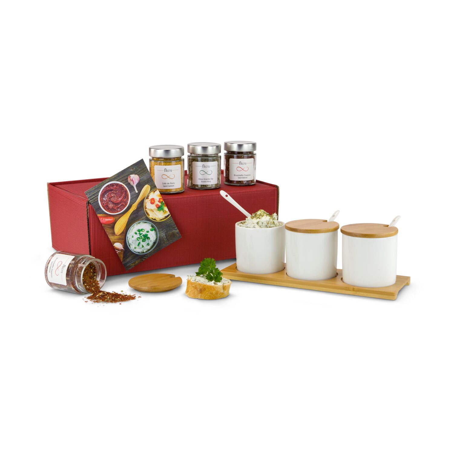 Das ROMINOX® Dip-Set Tre Malva mit 3 Keramikschalen, Löffel, Deckel und Servierbrett und passend dazu 3 Dip-Gewürzmischungen im Glas.