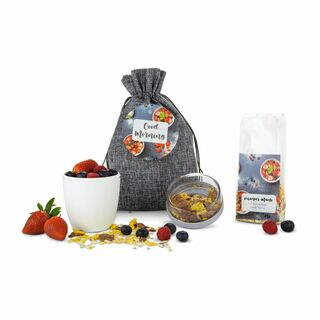 1 praktischer Lunchpot von Mepal® und 100 g leckeres Schokomüsli verpackt im grauen Sack mit Good Morning / Guten Morgen Anhänger
