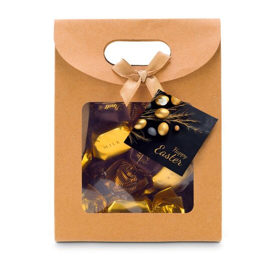 Je 4 Lindt-Nuxor-Pralinen (Feinherbe & Vollmilch Schokolade) verpackt in einer naturfarbenen Verpackung mit Schleife und Oser-Anhänger.